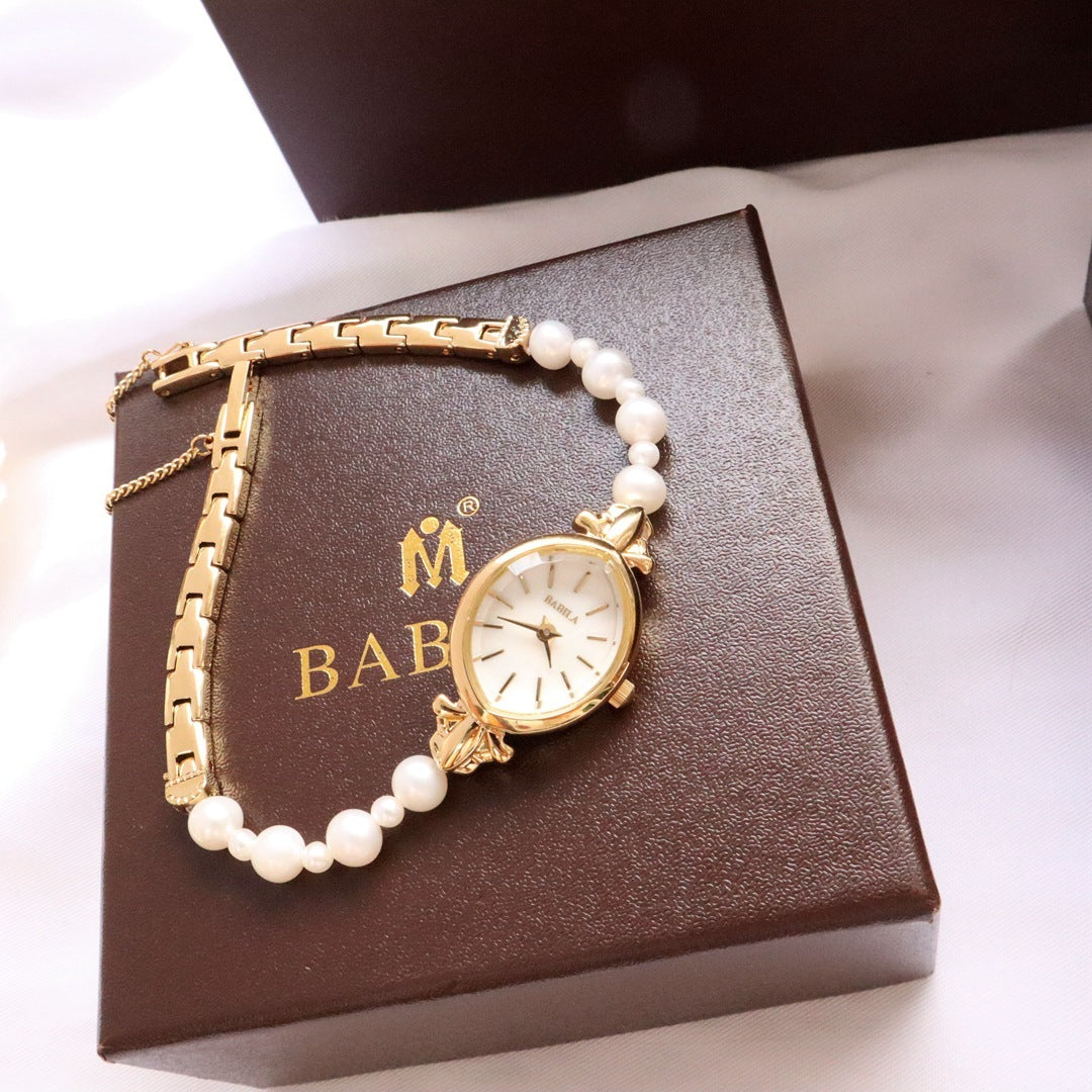 Montre Prestige Perles Naturelles & Or 14carats -  Élégance