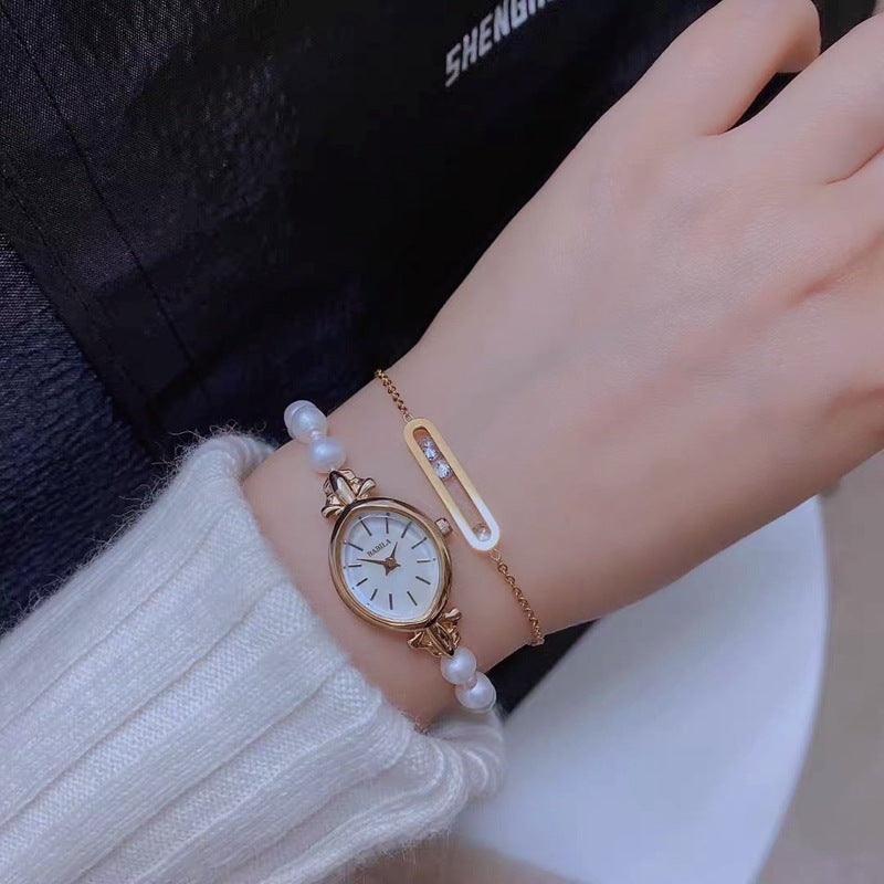 Montre Prestige Perles Naturelles & Or 14carats -  Élégance