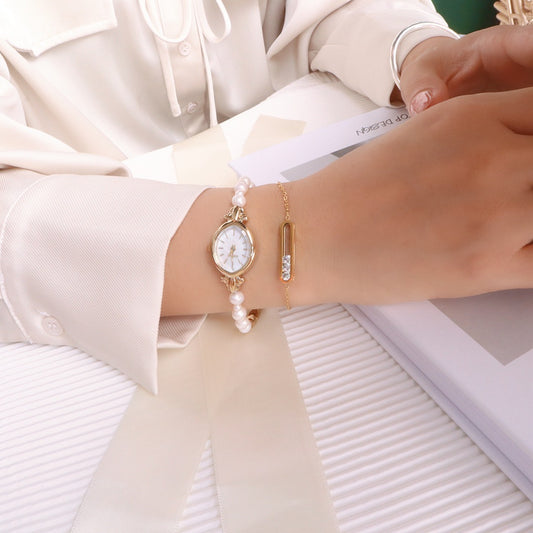 Montre Prestige Perles Naturelles & Or 14carats -  Élégance
