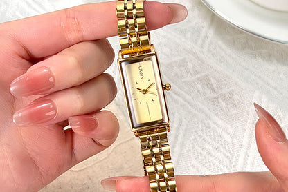 Montre Femme Dorée Rectangulaire – Élégance Moderne et Style Tendance
